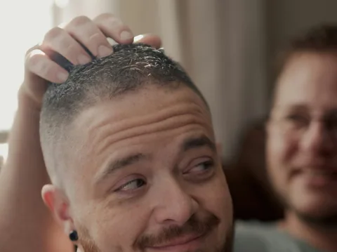 Illustrative photograph of a man at the barber